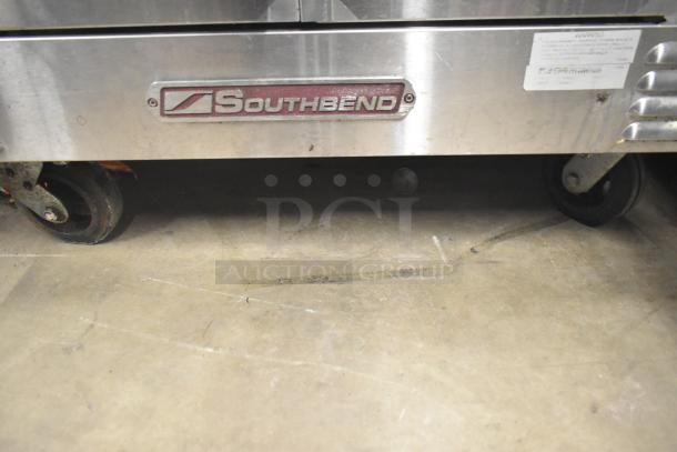 Southbend SLGS/12SG convection oven, stainless steel, on commercial casters. Features view-through doors, thermostatic controls.