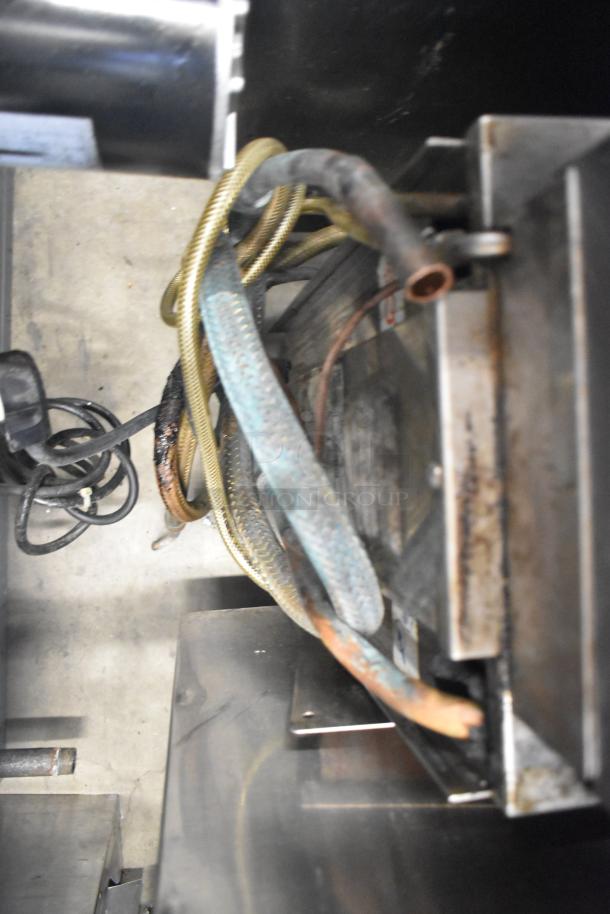 Taylor RD30-12 frozen drink machine, countertop model, 115V, visible cords and hoses, needs maintenance.