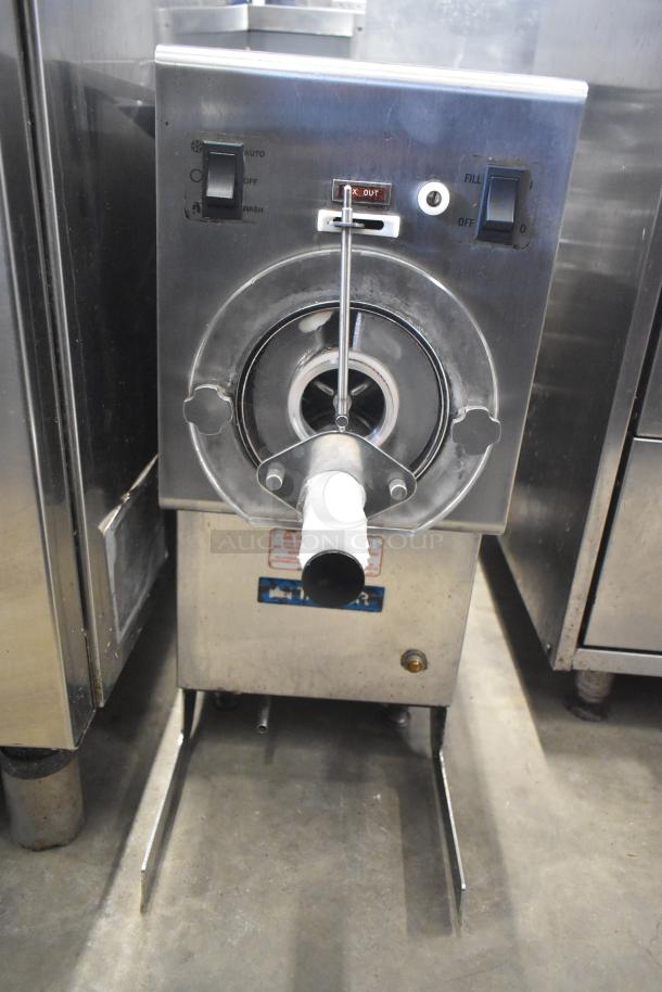 Taylor RD30-12 frozen drink machine, 115V, commercial countertop model. Features single flavor dispensing and controls for auto, off, and wash functions.