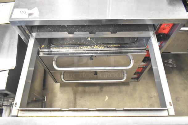 2019 Vulcan VW3S commercial warming drawer with 3 drawers, stainless steel, 120 volts, visible crumbs, model label on side.