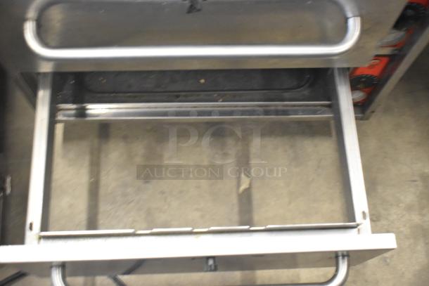 2019 Vulcan VW3S commercial 3 drawer warming drawer, stainless steel, open drawer view, 120V, 1 phase, used condition.