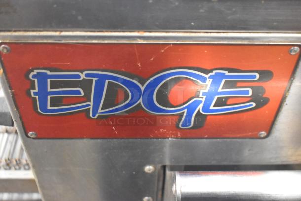 MF&B EDGE-1830-M commercial conveyor pizza oven, natural gas, metal casing with "EDGE" label, on casters.