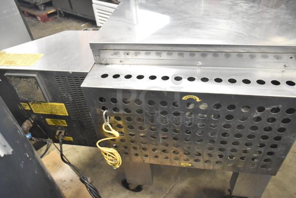 MF&B EDGE-1830-M commercial conveyor pizza oven, natural gas, single deck, includes commercial casters, in good condition.