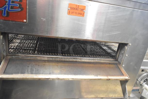 MF&B EDGE-1830-M commercial natural gas conveyor pizza oven, stainless steel, on casters, used condition, lift-to-open feature.