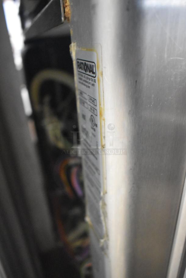 Rational SCCWE62/SCCWE102 stainless steel convection oven, visible wiring, Rational logo, commercial-grade.