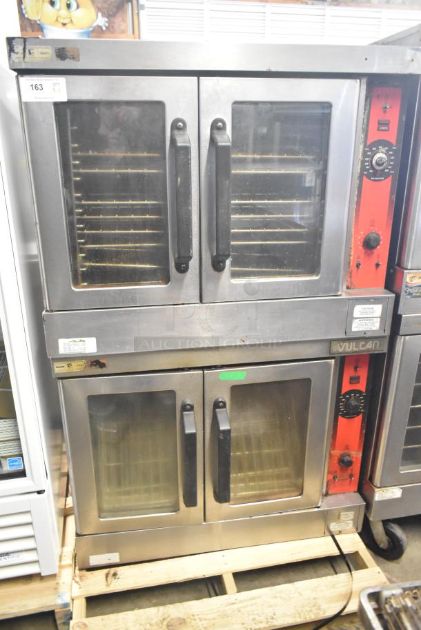 2 Vulcan full-size convection ovens with view-through doors, thermostatic controls, and multiple racks. Slight wear visible.