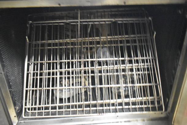 Vulcan commercial full-size convection oven with view-through doors, thermostatic controls, and multiple racks inside.