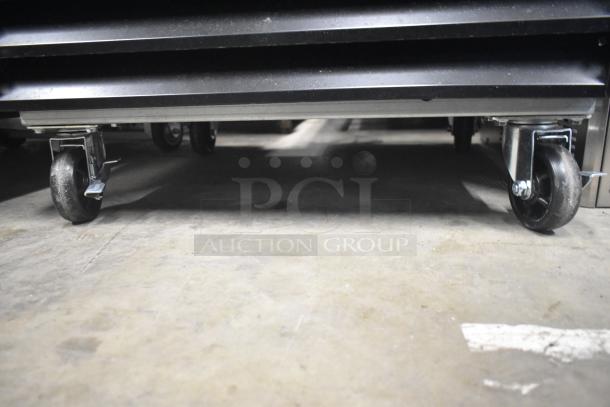 BRAND NEW 2024 Avantco 178GDC12FHCB 27" freezer base with caster wheels, customizable black finish, 115V, 1 phase.