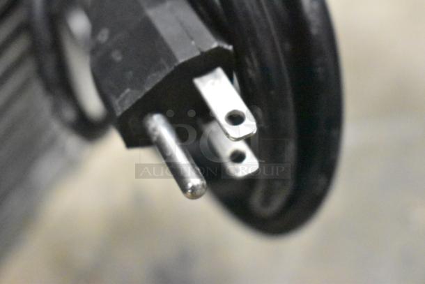 Close-up of a power plug for the 2023 Ice-O-Matic UCG 130 GA A ice machine. 115 volts, 1 phase.