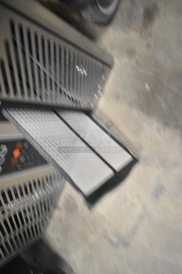 Alt text: 2023 Ice-O-Matic UCG 130 GA A ice machine, new scratch and dent, 121 lb capacity, 115V, visible vent details.