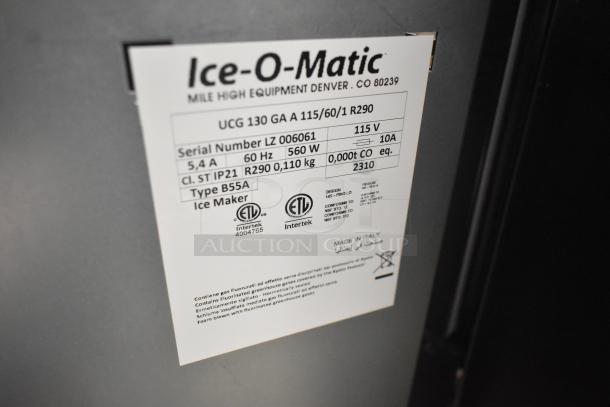 BRAND NEW 2023 Ice-O-Matic UCG 130 GA A ice machine, 121 lb., 115V, 1 Phase. Label shows model details and certifications.