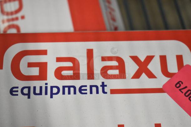 Brand new Galaxy RS110LP 110 lb. low-profile digital scale with remote display, slight scratches, shown in original packaging.