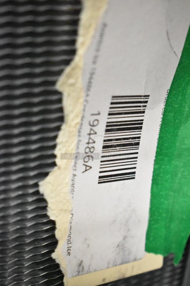 Avantco Ice condenser model 194486A, shown in close-up with torn label and barcode, scratch and dent condition.