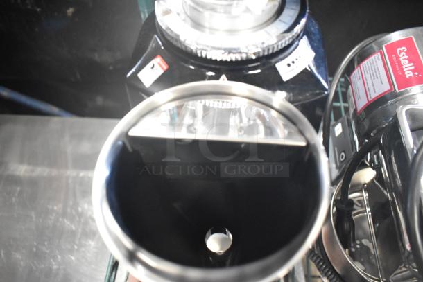 Brand new Estella Caffe 236ECEGOD on-demand espresso grinder. Features include visible labels and 120 volts, 1 phase.