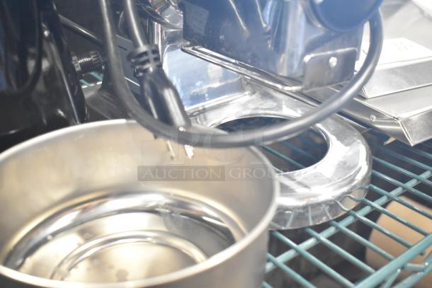 BRAND NEW Estella 348CG12 electric hard cheese grater, 1.1 lb/min, 120V, with minor scratches and dents.