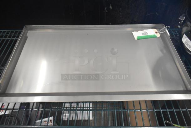 Brand new Avantco 36000167 Prep Rail Lid for CPT-40, stainless steel, visible barcode tag, no visible scratches.