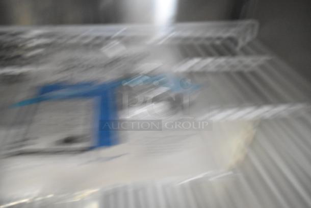 Blurred image of the Avantco 178APT60HC commercial sandwich salad prep table, condition labeled as scratch and dent.