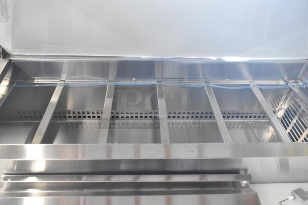 New Avantco Commercial Pizza Prep Table, stainless steel, 4 drawers, 1 door, 115V, slight scratches and dents.