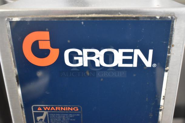 Groen TDB-20 commercial countertop steam kettle, 20 quart capacity. Blue panel with white Groen logo. Warning label visible.