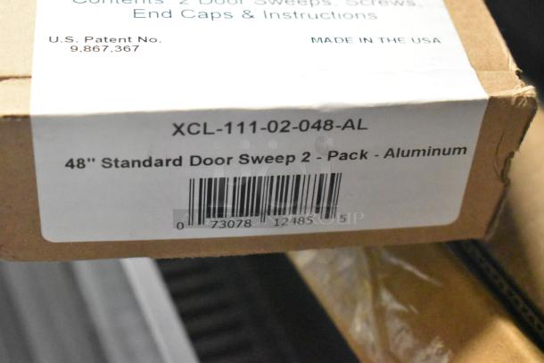 Three boxes with 48" standard aluminum door sweeps, model XCL-111-02-048-AL, includes end caps and screws.