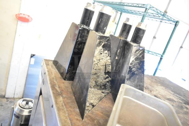 2 Montague 14-P-1 commercial pizza ovens with cooking stones, featuring natural gas power and single deck design. 