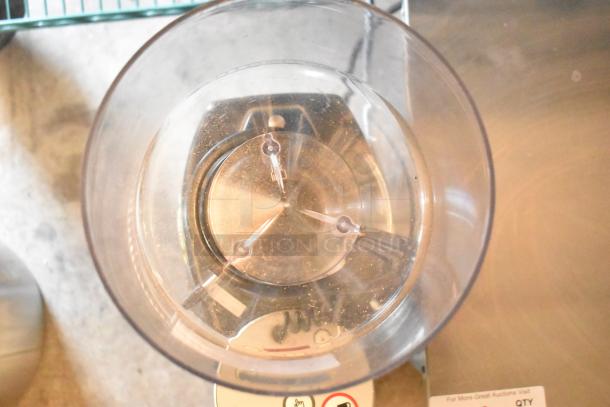 Mazzer Luigi countertop espresso bean grinder, clear hopper, 110 volts, 1 phase, gently used with minor wear visible.