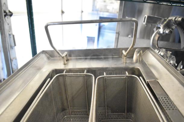 Waring WPC100 electric pasta cooker rethermalizer with dual baskets, 208/240 volts, stainless steel, countertop model.