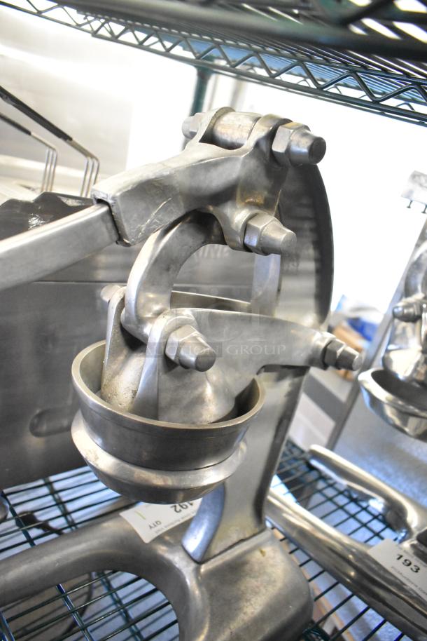 RA Chand Countertop Manual Citrus Juicer, metal construction, sturdy build, excellent condition, auction tag visible.