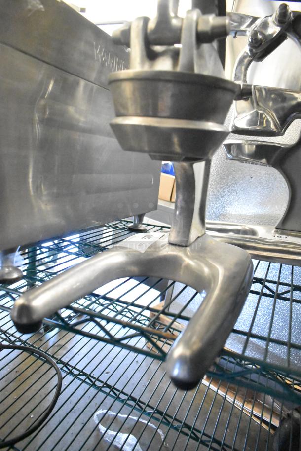 RA Chand Countertop Manual Citrus Juicer, metallic finish, robust construction, good condition, perfect for efficient juicing.