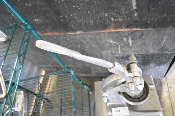 RA Chand Countertop Manual Citrus Juicer, stainless steel, used condition, features sturdy lever and base, label number 192.