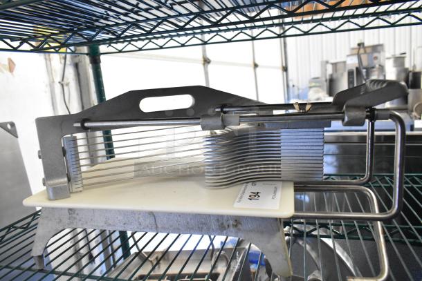 Countertop Tomato Slicer with stainless steel blades and sturdy metal frame, excellent condition. Tag reads "194".