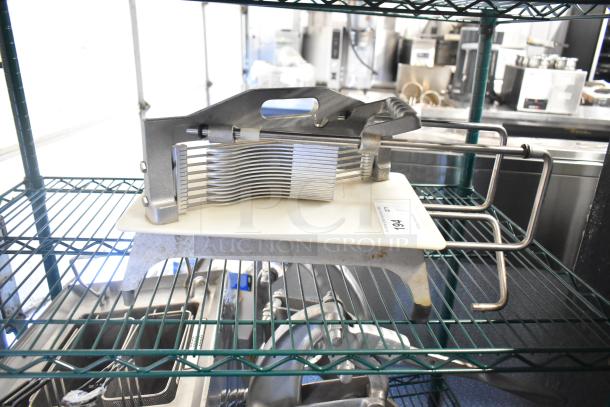 Countertop Tomato Slicer with stainless steel blades on a white base. Visible label reads "194"; used but in good condition.