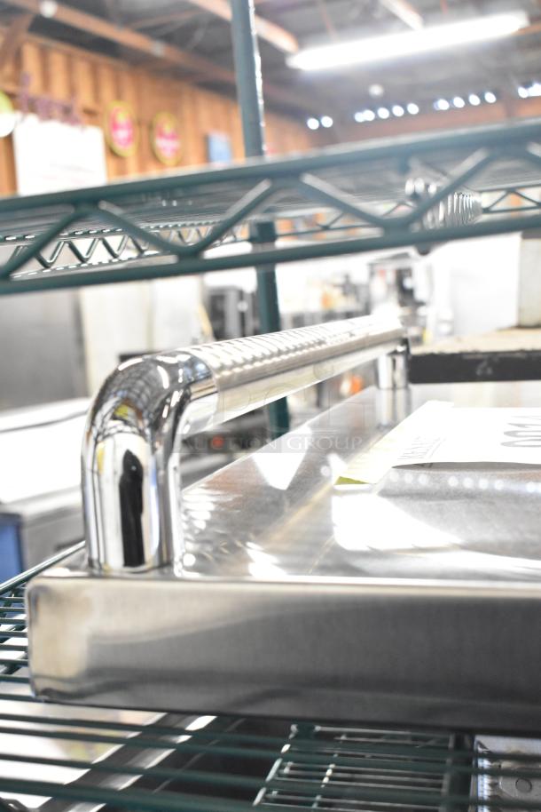 Brand new Imperial 38800 door assembly for IR-36, stainless steel with minor scratches and dents, chrome handle.