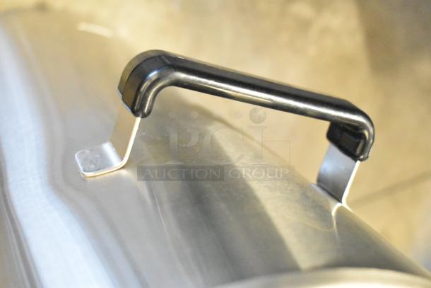 BRAND NEW Fetco TPD-30 Luxus 3 Gallon Coffee Dispenser, stainless steel, slight cosmetic blemishes, durable black handle.