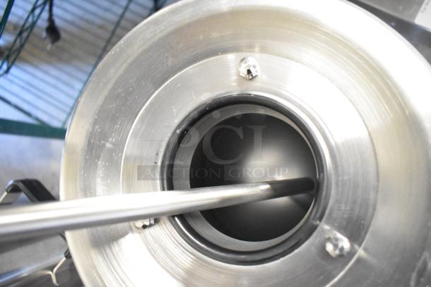 Stainless steel interior of Fetco TPD-30 Luxus 3-gallon coffee dispenser, showing new condition with minor scratches.