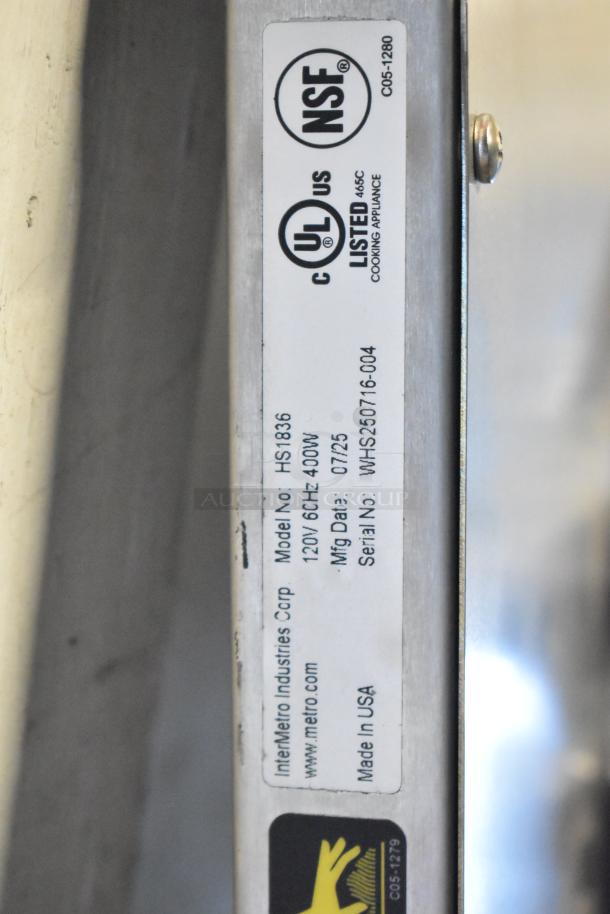 BRAND NEW Metro 461HS1836 stainless steel heated shelf, 18" x 36", 120V, 1 phase. Tag shows model HS1836, made in USA.