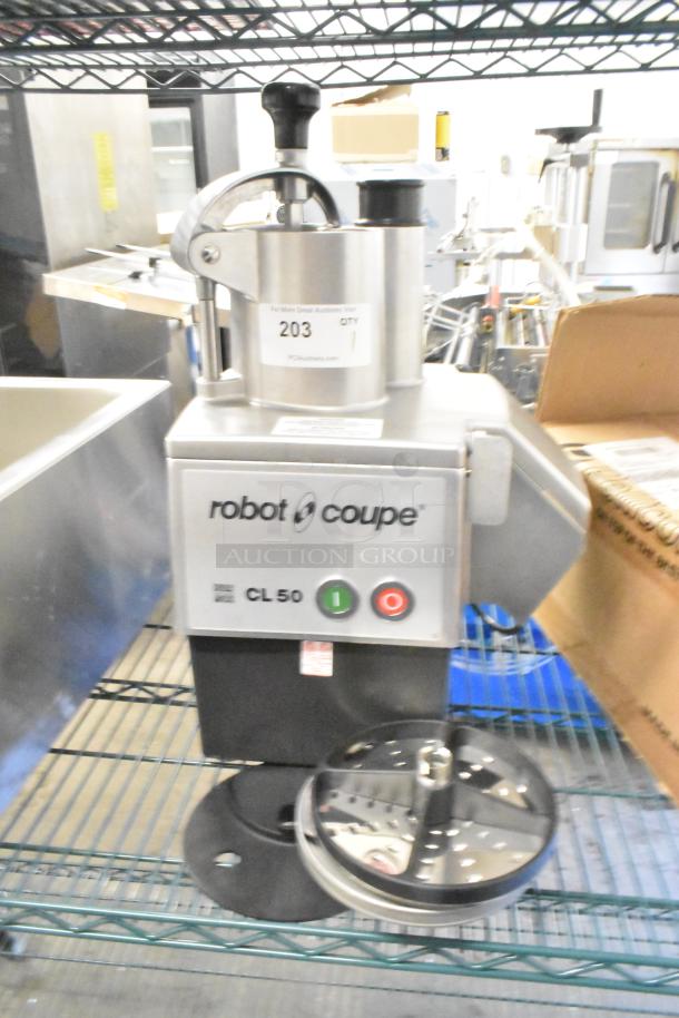 Brand new Robot Coupe CL 50 Series E countertop food processor, 120V, with blades. Scratch and dent condition.