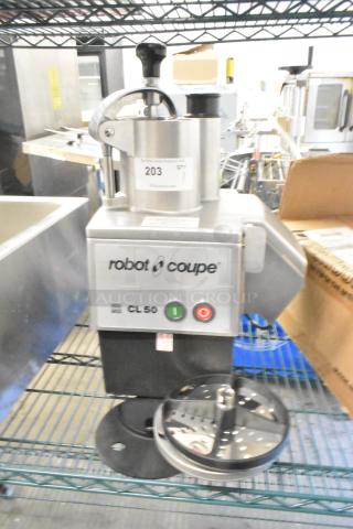 Brand new Robot Coupe CL 50 Series E countertop food processor, 120V, with blades. Scratch and dent condition.