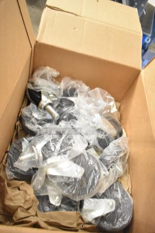 Lot of Pelliconi commercial casters in a box, brand new with minor scratches and dents. Each caster is wrapped in plastic.