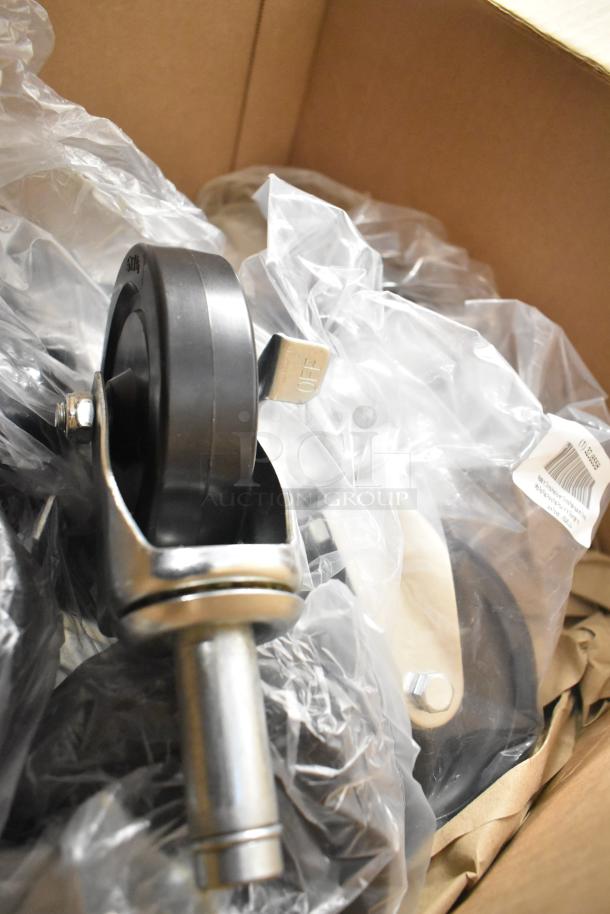 Lot of Pelliconi commercial casters, brand new with minor scratches, shown in original packaging with visible off markings.