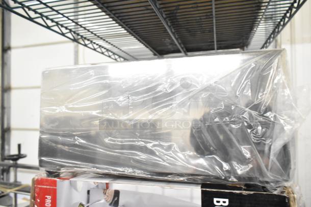 Brand new Chef Master 90217 stainless steel butane stove cover, dimensions 7 3/16" x 14 1/2" x 12", in packaging.