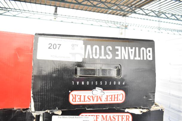 Brand new Chef Master 90217 stainless steel butane stove cover, size 7 3/16" x 14 1/2" x 12", with packaging wear.