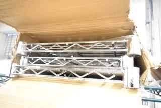 Brand new 460EC chrome finish wire shelves, slight scratches and dents, shown in original box.