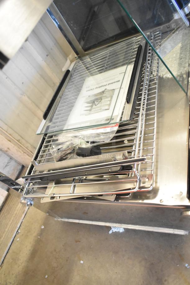 ServIt 423HDM26SA 26" heated display case, 3 shelves, sliding doors, scratch and dent, visible broken glass on side.