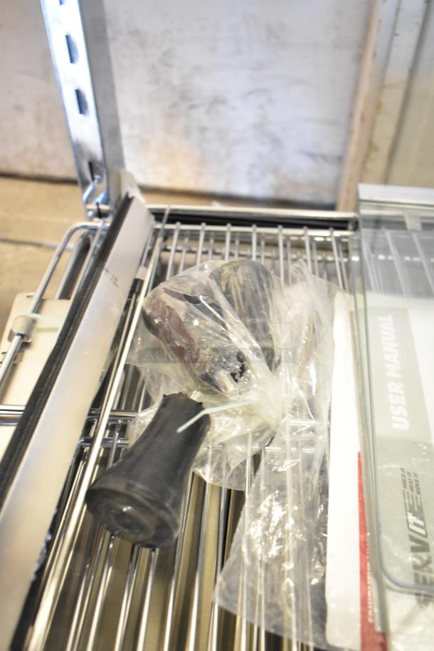 ServIt 423HDM26SA 26" heated display case with sliding doors, 3 shelves. Scratch and dent, broken glass visible. 120 Volts, 1 Phase.