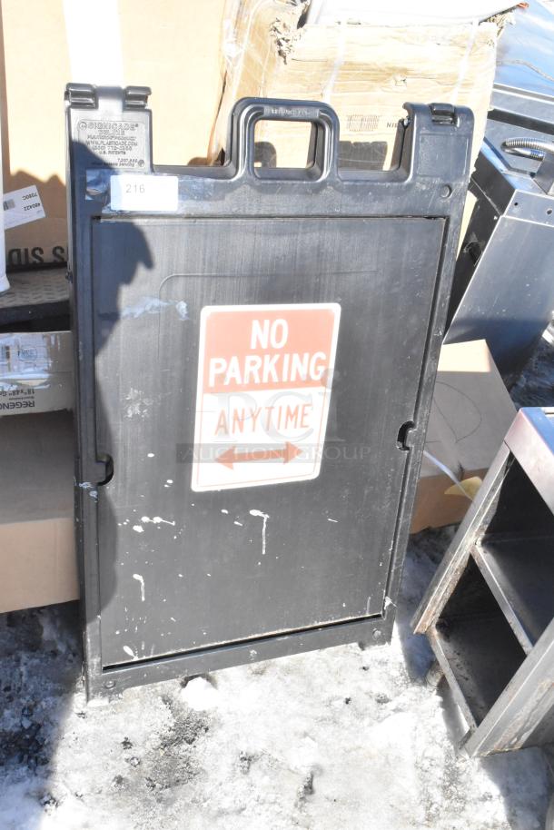 Black Poly A Frame Sidewalk Sign, featuring "No Parking Anytime" message. Minor scratches visible, sturdy condition.