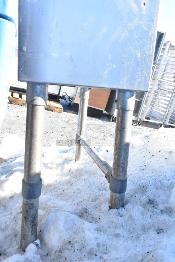 BK Resources BKUBD-12-21S underbar drainboard, stainless steel, durable legs, suitable for commercial use, slight wear visible.