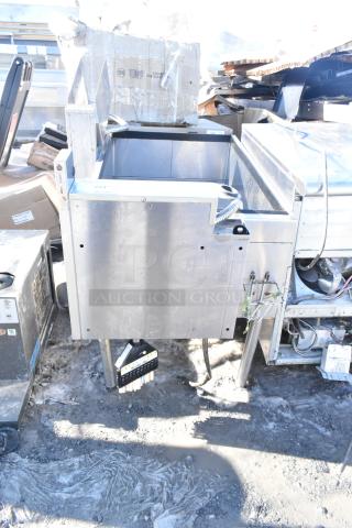 Commercial ice bin with Wunderbar soda gun, stainless steel, used condition, includes attached dispensing hoses.