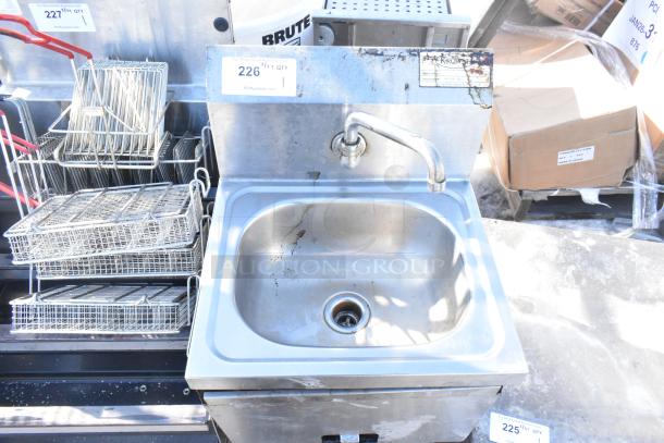 Krowne Single Bay Sink with faucet, stainless steel, moderate wear, visible stains, mounted on counter, auction tag labeled "226".