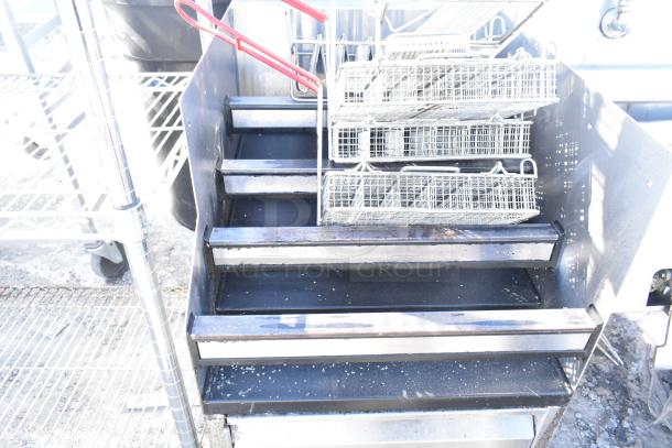 Glastender LDA-18S 4-level raised liquor display with fry baskets, showing moderate wear, red rail handles included.